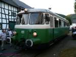Rhein-Sieg-Eisenbahn RSE-VT23 MAN-Schienenbus auf Sonderfahrt auf der Oleftalbahn.
Hier bei der ber�hmten Eisenbahnquerung des Ortsplatzes von Olef.
Hier f�hrt die Bahn mitten �ber den Ortsplatz.
Der ehemalige MEG VT23 (sp�ter SWEG) ist wieder in den urspr�nglichen Farben der MEG (Mittelbadische Eisenbahn) unterwegs.
26.09.09