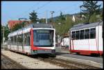 OEG 122 neben dem 109 am 12.9.2006 in Weinheim OEG. ...