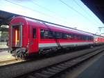 Moderner Personenwagen der rumaenischen Staatseisenbahn, ausgestellt im bukarester Nordbahnhof am 10.06.2014