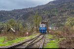 Am 15.04.2023 fährt CFR Călători 64 0950 mit dem Regio 4116 über die Stahlbrücke mit dem Vierschienengleis bei Valea Vișeului, Rumänien und konnte hier mit einem sicheren Abstand aufgenommen werden