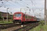 Zwei verschiedene ehemals SNCF Triebwagen fahren hier am 12.5.2010   im Nahverkehr fr Regio Trans aus dem Bahnhof Timisoara Nord aus.