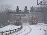 S- und Regionalbahnen auf der verschneiten Stadtbahn. Berlin Zoologischer Garten, ...