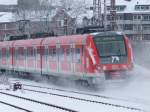 S-Bahn Rhein-Ruhr 422 013 am 03.01.2010 auf dem Weg nach Wuppertal bei der Ausfahrt aus Essen Hbf.