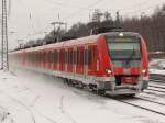 S-Bahn Rhein-Ruhr 422 048 erreicht als Vollzug den Haltepunkt Bochum-Ehrenfeld auf der S1 in Richtung Dortmund am 10.01.2010.