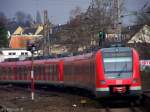 S-Bahn Rhein-Ruhr 422 018/518 verl�sst mit einer Schwestereinheit(422 041/541) den bahnhof M�lheim(Ruhr) in Richtung Dortmund Hbf als S1. 02.03.10