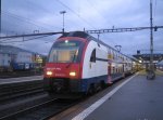 RABe 514 012-4 Russikon am 26.11.09 in Rapperswil. Ankommende DTZ ...