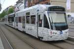 Saarbahn Die Saarbahn auf diesem Bild tr�gt Werbung f�r ein Autohaus im Saarland. Das Bild habe ich am 08.05.2010 in Saarbr�cken Landwehrplatz aufgenommen.Dies ist eine neue Bahn mit Werbung die seit dieser Woche f�hrt.