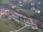Ein unbekannter RE verlässt soeben Bahnhof Kurort Rathen.Von der Bastei ... Ein unbekannter RE verlässt soeben Bahnhof Kurort Rathen.Von der Bastei ...