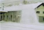 Schneeschleuder in Aktion in Airolo im Winter 2006. Hinweis: Gescanntes Bild.