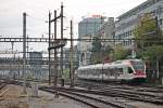 Nachschuss auf RABe 521 015 am 25.10.2014, als dieser als S1 (Olten - Porrentruy) aus Basel SBB fuhr.