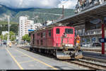 MGB ex-FO HGe 4/4 I 32 am 25. Juli 2017 auf dem Bahnhofplatz in Brig. Die Lok dient als Rangierfahrzeug im Depot Glisergrund und holt in Brig einen Gelenksteuerwagen ab, der als Modul eingesetzt wurde.