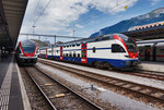 Links der RABe 511 026 als RE 4872  RHEINTAL-EXPRESS  (Chur - St. Gallen - Wil SG) und rechts der RABe 511 046 als RE 5070 (Chur - Zürich HB).
Aufgenommen am 21.7.2016, in Chur.