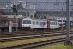 ABt 383 und RBDe 4/4 171 (567 171) fahren bereits aus St. Margrethen wieder aus. Februar 2023.