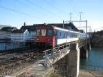 BDt EWII mit EW I/II Pendel (und Re 4/4 II 11158) als Ersatzzug zum IR 2122 auf der Aarebrcke in Solothurn, 03.01.2011.