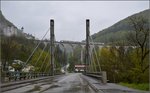 Auf dem Viadukt von St.Ursanne. Ein NPZ berquert den Viadukt Richtung Delsberg. April 2016.