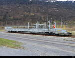 BLS - Autotransportwagen Sdt 50 85 98 04 054-3 abgestellt im Bahnhofsareal in Interlaken Ost am 09.03.2024 .. Standort des Fotografen Ausserhalb des Geleibereich