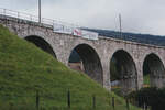 Am 16. September 1996 verkehrte ein Demonstrationszug mit dem BDe 4/4 ll 252  Willisau  und dem unpassenden ABt 952 für die Erhaltung der SMB nach Moutier. Auf der Rückfahrt wurden am Viadukt in Corcelles entsprechende Transparente ausgerollt. 
Rettet unsere Bahn !
Sauvez notre train !
Pro SMB
Foto: Walter Ruetsch