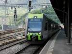 BLS - Triebwagen RABe 535 112 + RAE 535 119 als RE nach Bern im Bahnhof Brig am 26.04.2014