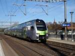 BLS - Triebzug RABe 515 001 bei der einfahrt im Bahnhof Münsigen am 24.12.2015