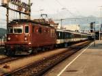 161  Re 4/4 der BLS mit IC Monteverdi Venezia-Basel SBB auf Bahnhof Spiez am 26-07-95. Bild und scan: Date Jan de Vries.