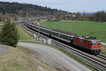 SBB: Fan-Sonderzug Basel - Bern mit der Re 4/4 II 11144, erste Serie, bei Langenthal auf der Hinfahrt am 2.