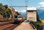 Sonderzug des Reisebüro Mittelthurgau auf der Lötschberg-Südrampe der alten Bergstrecke bei Ausserberg im Juli 1986.