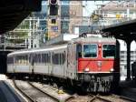 SBB - Re 4/4 11118 mit Regio bei der einfahrt in den Bahnhof von Fribourg am 05.07.2008