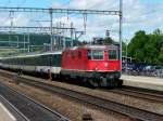 SBB - Re 4/4 11216 unterwegs mit Schnellzug in Liestal am 03.08.2008