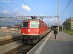 Re 4/4'' 11207 am 22.9.09 in Sargans. Sie hat den IR 1786 nach Basel am Haken, der zuvor als EC7 aus Hamburg nach Chur fuhr.