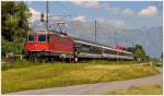 Der ALTE RHEINTALEXPRESS  RE3815 mit Re 4/4 II 11135 bei Sevelen.