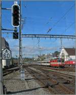 Die Swiss Express Re 4/4 II 11108 erreicht mit dem IR 1717 Lausanne. 
18. Okt. 2013