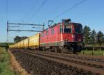 SBB: Postzug mit Re 4/4 11267 bie Niederbipp am 17. Oktober 2013.
Foto: Walter Ruetsch