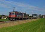 SBB/MAKIES AG: Kieszug mit Doppeltraktion Re 4/4 II bei Gettnau auf der Fahrt in Richtung Langenthal am 29.