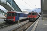 Seltenes Dispozugstreffen in Chur: Links; BDt EWI 50 85 82-33 986-9 mit dem Dispo Zrich als IC 70565/570; rechts; Re 4/4 II 11140 (420 140-6) mit dem Dispo Olten beim Wenden als ICE 70271/70070,