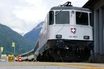 Re 420 268 mit der Gottardo 2016 Werbung, auch Schnewittchen genannt beim Festplatz Erstfeld am 5.6.2016.