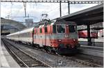 IC928 mit Re 4/4 II 11108 und RE1740 mit Ge 4/4 II 612  Thusis2 in Chur. (02.02.2017)