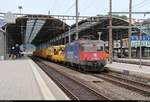 Bauzug mit Re 4/4 II (421 393-0) der SBB Cargo wartet auf Weiterfahrt im Bahnhof Olten (CH) auf Gleis 8 in südliche Richtung.
[10.7.2018 | 13:18 Uhr]