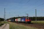 Mit einem Containerzug ist 421 397-1 auf der KBS 305 in Richtung Magdeburg unterwegs. Fotografiert am 07.06.2014 in Angern-Rogätz. 