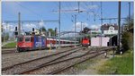 Parallel zur Abstellanlage der RHB verläuft die SBB Strecke nach St.Margrethen. EC194 mit 421 371-6 aus München Hbf rauscht vorbei. (28.04.2016)