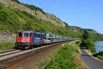 Der DGS 75734 von Regensburg Ost nach Bremerhaven Nordhafen war am 03. Juli 2014 aus offenen Cobelfret-Autotransportwagen gebildet. Ladegut waren BMWs der 1-er, 3-er, 4-er und Z4 Reihe, die im Werk Regensburg produziert wurden. Zuglok war die an TXLogistik vermietete SBB Cargo 421 391. Aufgenommen wurde der  Millionenzug  am Kilometer 28,2 zwischen Karlstadt und Gambach im Maintal.