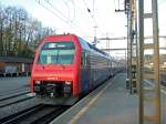 SBB: Eine S3 nach Aarau wird am 15.4.09 von der Re 450 041  Buchs+ Dllikon  aus dem Bahnhof Othmarsingen geschoben.