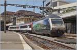 Die SBB Re 460 005-2  Thales  wartet in Lausanne mit dem neuen Infrastukurdiagnose -Wagen (UIC X 99 85 93-61 247-1 CH SBBI) und einem Bt auf die Abfahrt.