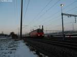 Re 460 081-3 ''Pfnder'' am 18.2.2010 bei der Unterhaltsnalage Oberwinterthur mit dem IR 9072, der planmssig mit einem 200er-Pendel (EW IV fr vmax 200km/h, in LBT und auf NBS zugelassen) gefhrt