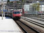 SBB - 460 098-7 mit Schnellzug bei der einfahrt in den Bahnhof Sierre am 18.03.2011    