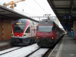 SBB - Triebzug RABe 511 101 und 460 097-9 im Bahnhof Genf am 14.02.2013