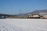 Die Re 460 041-7 befindet sich am 01.01.2015 mit dem IC 1067 in Sissach.