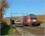 Die SBB Re 460 015-1, unterwegs mit einem IR von Genève nach Brig bei Lutry, wirbt für ein Ereignis, welches man selbst mit bestem Willen nicht übersehen kann.