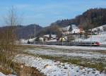 SBB: Zug in der Landschaft. Eine Re 460 schiebt am 14. Februar 2015 den EW IV-Pendel als IR Olten-Bern bei Riedtwil im letzten Abendlicht in Richtung Bern. 
Foto: Walter Ruetsch