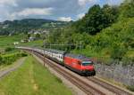 Re 460 061 mit einem IC am 26.08.2013 bei Bossiere. 