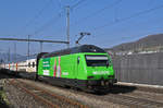 Re 460 080-5, mit der Migros Werbung, durchfährt den Bahnhof Gelterkinden. Die Aufnahme stammt vom 16.03.2017.